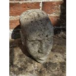 A carved stone head.