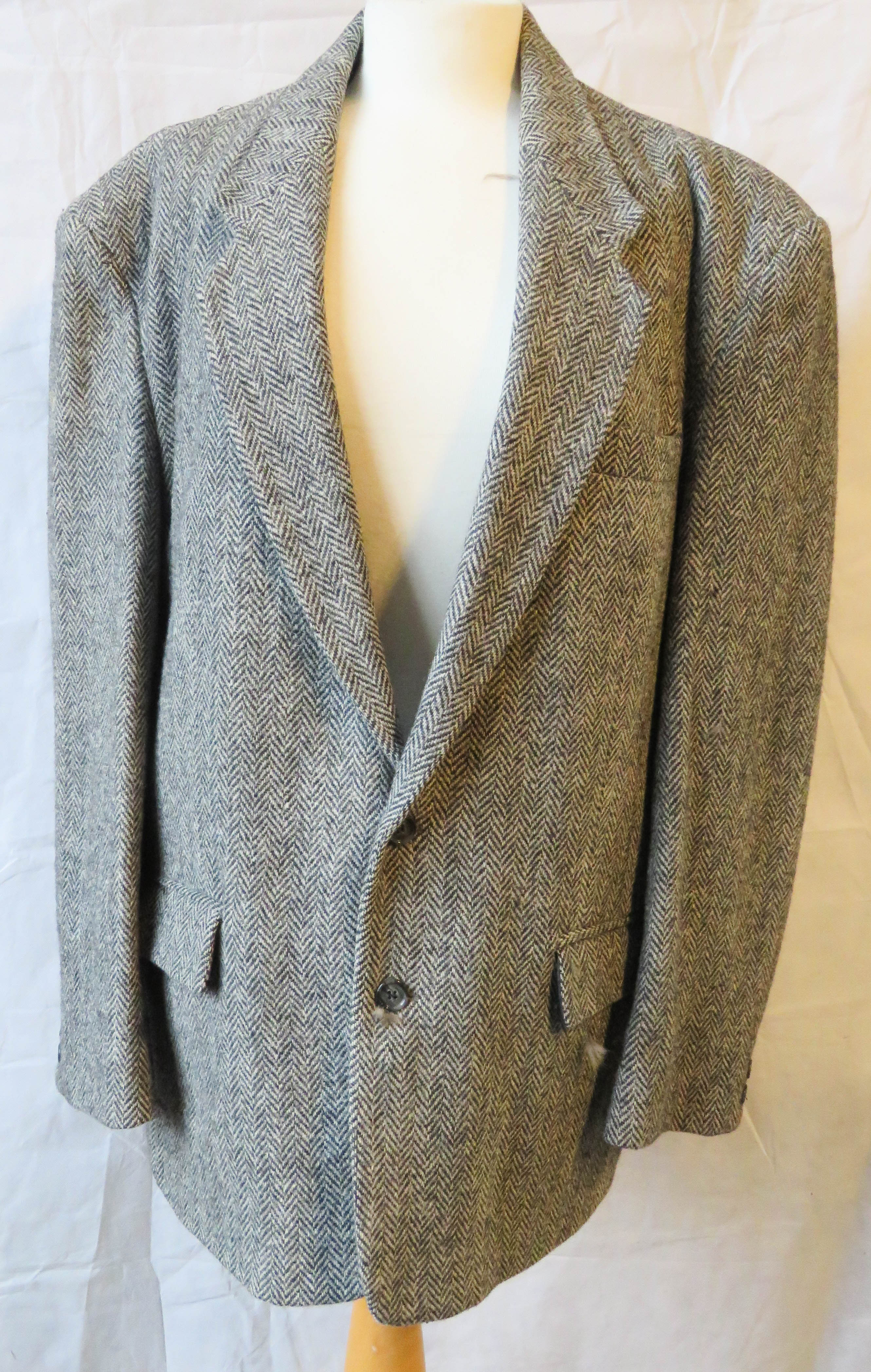 A mens Harris tweed wool suit jacket size 44.