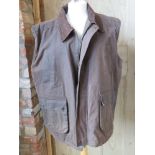 A waxed cotton gilet by PG Field, size XL.
