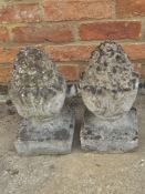 A pair of cast garden artichoke finials, bases 18 x 18cm, 34cm high.