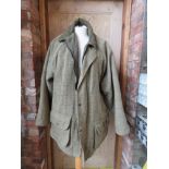 A 50% wool tweed jacket by Lavenir Outdoor Garments, size L.