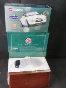 Corgi; three 1;18 scale MG cars in boxes.