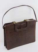 A vintage leather ladies briefcase,