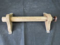 A wooden towel rail.