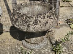 A cast garden planter (in two parts)