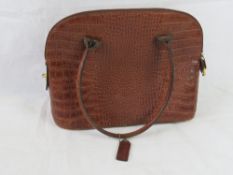 A vintage leather handbag.