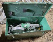A Hitachi WC65 wall chaser disc grinder in metal case.