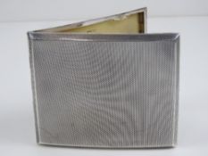 A HM silver cigarette case having engine turned pattern throughout,