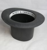A Moet et Chandon 'top hat' ice bucket champagne cooler.