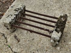 An iron boot scraper.