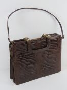 A vintage leather ladies briefcase,