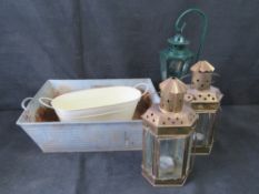 Two planters and three lanterns.