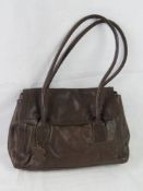 A brown leather handbag.