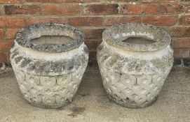 A pair of large Cotswold Studios composition stone planters.