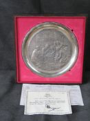 A silver Christmas plate by Birmingham Mint, Silver Jubilee hallmark, Sheffield 1977, 20cm diameter,