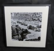 Signed by Tony Brooks; a photographic print of the Monaco Grand Prix 1958, signed by Tony Brooks,