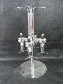 A rotating drinks optic for four bottles.