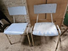 Two mid century stacking chairs.