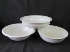 Three large wash bowls including one lustreware.