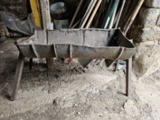 A half barrel barbecue.