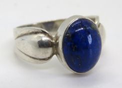 A silver and Lapis Lazuli ring, makers mark upon, stamped silver.