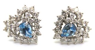 A pair of 18ct white gold diamond and aquamarine heart shaped cluster earrings, approx 14mm wide,