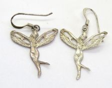 A pair of silver fairy earrings, stamped 925.