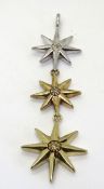 A silver graduated stars pendant, stamped 925 with makers mark BGE.