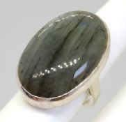 A large and impressive silver and hardstone ring, stamped 925.