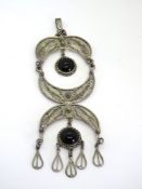 A large filigree statement piece pendant stamped Israel 925.