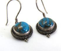 A pair of Native American style silver and turquoise earrings, stamped 925.