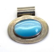A large blue stone and silver pendant, stamped Mexico 925.
