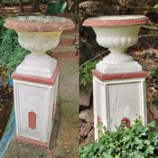 To match 91 - A pair of cast concrete classical garden urns raised over square shaped bases