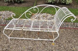 A metal painted garden chaise longue, for decorative use oxidation throughout.