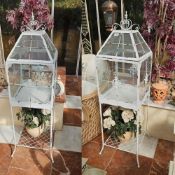 A pair of contemporary glazed shabby chic terrariums, 140cm high.