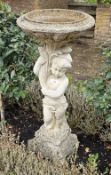 A single garden bird bath of cornucopia form, 102cm.
