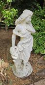 A single cast concrete garden statue standing 132cm high.