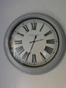 A contemporary battery wall clock.