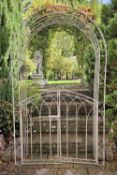 A metal arched pergola with double gates, 146cm wide, 246 high.