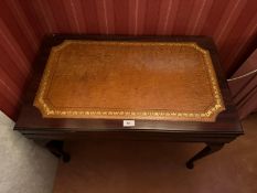 A 20th century leather topped mahogany cutlery table, 77 x 47 x 57cm, lid lifting to reveal velvet