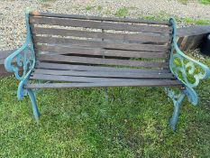 A garden bench with cast metal ends. For restoration/repair. 126cm wide.