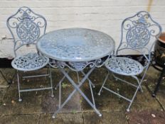 A metal garden bistro set, table 70cm dia.