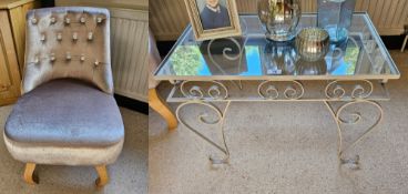 A wrought iron glass topped side table, 66cm wide. Together with a single button back contemporary