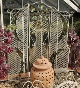 A decorative threefold screen in the form of a vase, 177cm high.