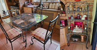 A contemporary glass top square shaped kitchen table raised over wrought iron base, together