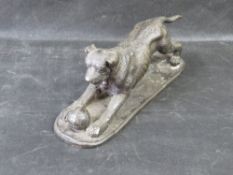 After J.P Mene; bronze figure of playful dog, on naturalistic base, 26cm long.