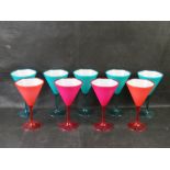 A quantity of plastic cocktail glasses.