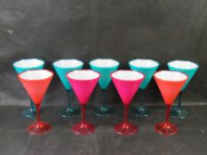 A quantity of plastic cocktail glasses.