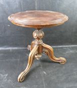 .A mahogany wine table.