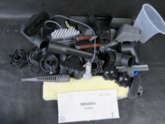 A quantity of accessories for Karcher and Miele.
